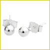 A pair of small, round silver stud earrings with butterfly backs displayed on a white background.