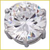 A close-up of a round, faceted diamond set in a silver prong setting.