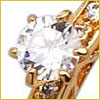 Close-up of a gold ring with a large round clear gemstone, possibly a diamond, in a prong setting.