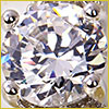 Close-up of a round, faceted diamond held by four metal prongs in a jewelry setting, sparkling with reflected light.