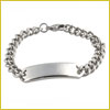 A silver chain bracelet with a blank rectangular nameplate in the center, displayed on a white background.