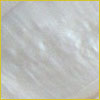 Close-up of a smooth, iridescent white surface with subtle wavy patterns, possibly mother-of-pearl or nacre.