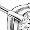 Close-up of a silver earring with a clear, round gemstone set in a prong setting against a white background.