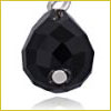 A black, faceted teardrop-shaped pendant with a small metal circle near the bottom and a metal loop at the top.