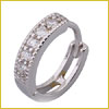 Silver ring with rows of small, sparkling diamonds set along the band, photographed on a white background.