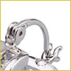 Close-up of a silver earring latch with a curved lever-back clasp against a white background.