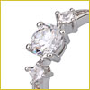 Close-up of a silver ring featuring three round, sparkling clear gemstones set in a row.