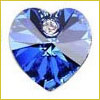 A faceted, heart-shaped blue gemstone with sparkling highlights on a white background.